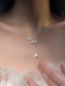 Preview: Elegante, minimalistische Halskette mit drei Herzquasten